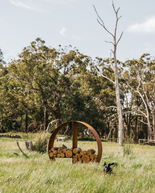 Our Wood Stacker with our Dog